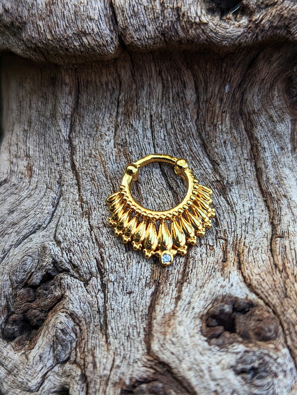 Septum jewelry with an American diamond in the middle highest quality gold polish